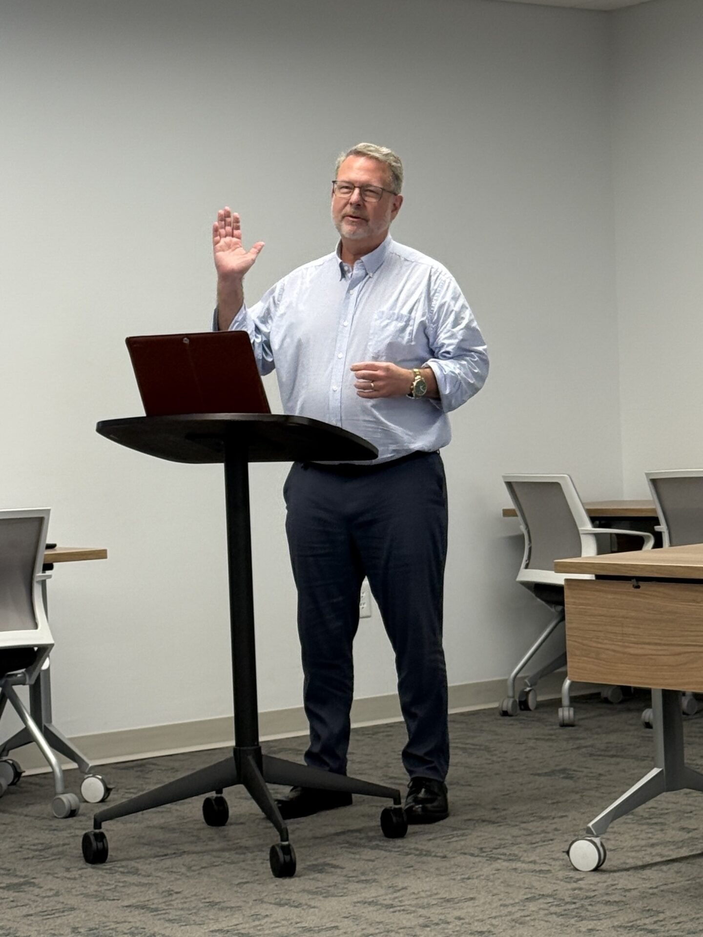 Speaker presenting at a LeadsOne meeting